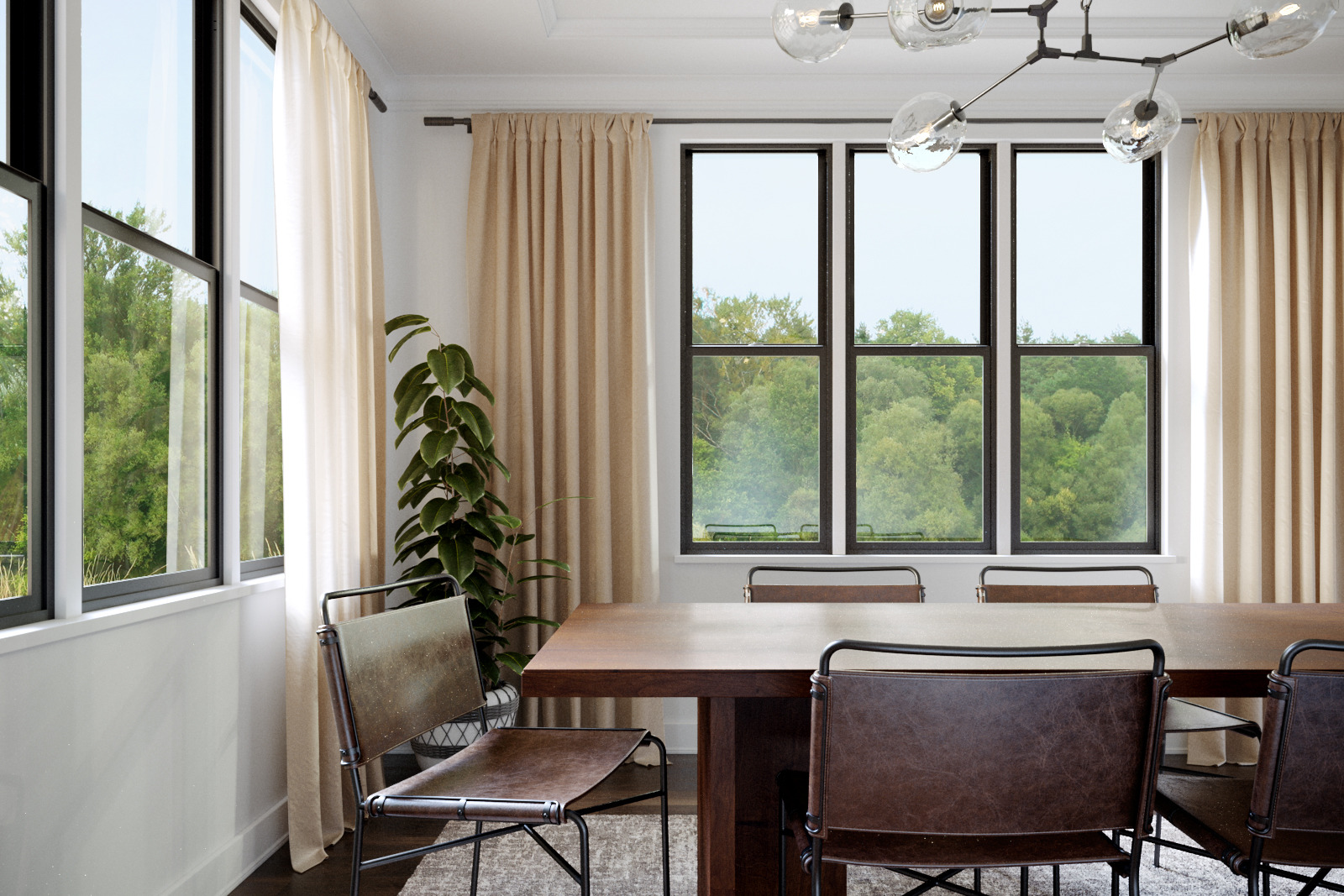 Interior of dining room with Auraline Single-hung windows in black
